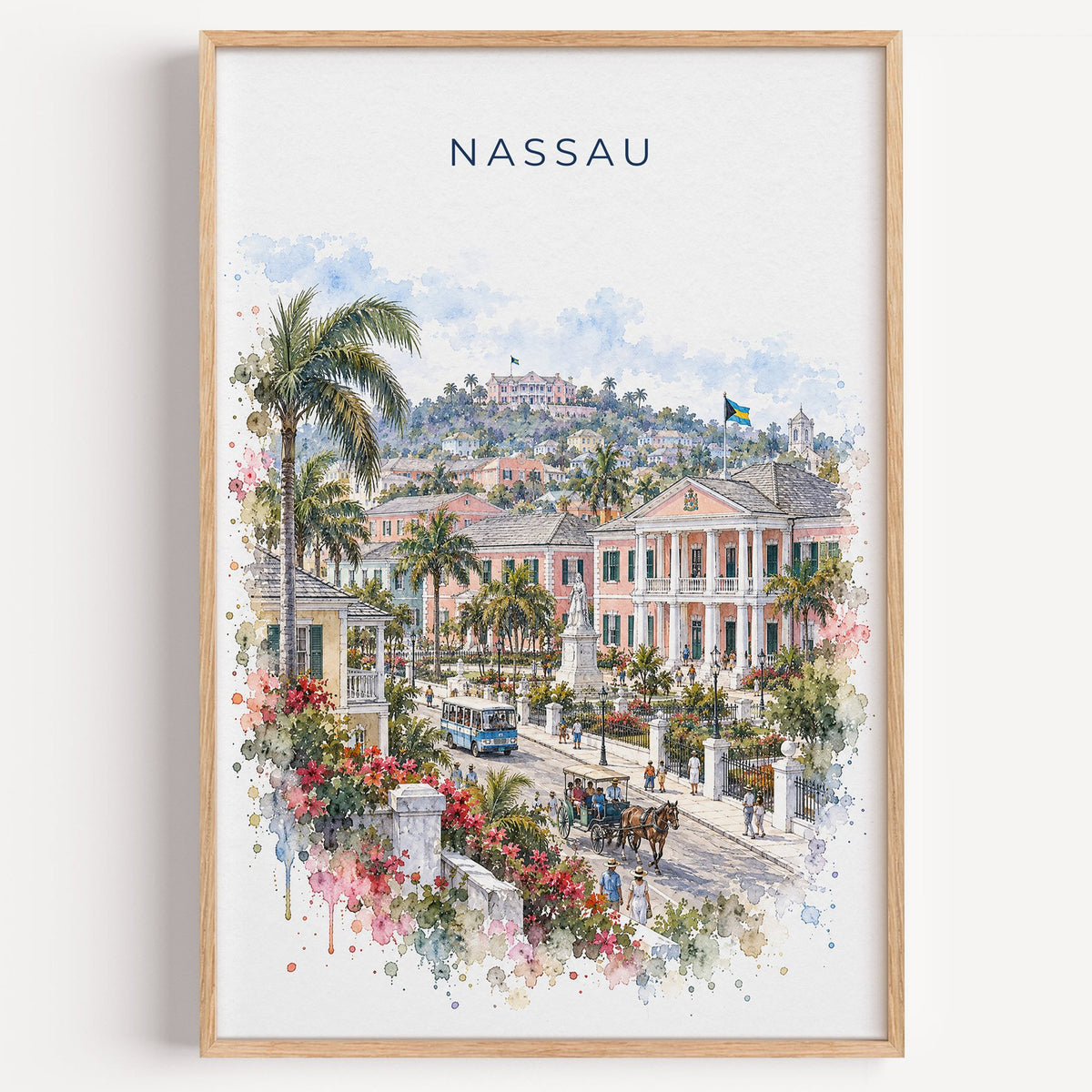 Nassau watercolor print in a light oak frame on a plain white wall