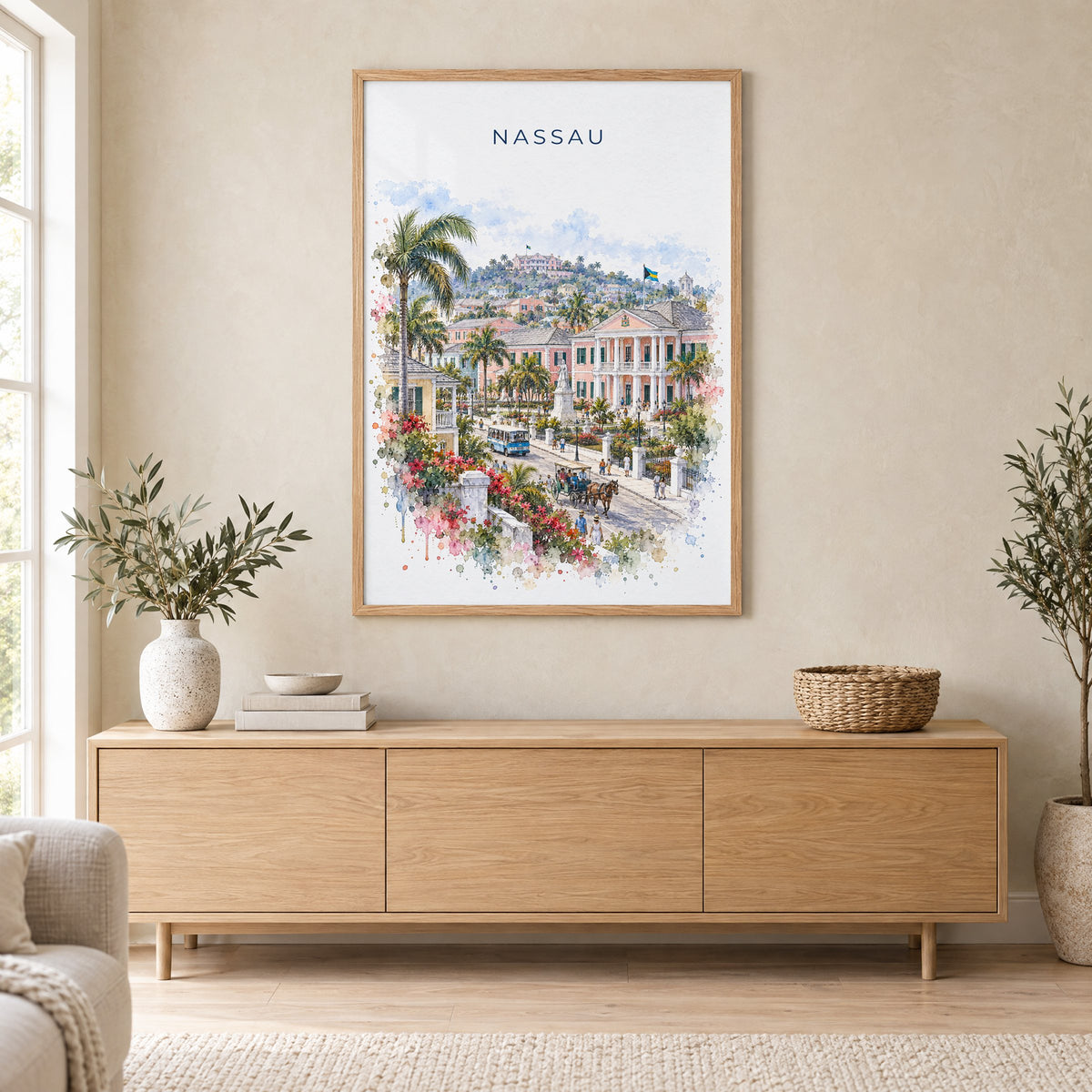 Nassau watercolor print in an oak frame above a light wood sideboard in a Scandinavian living room