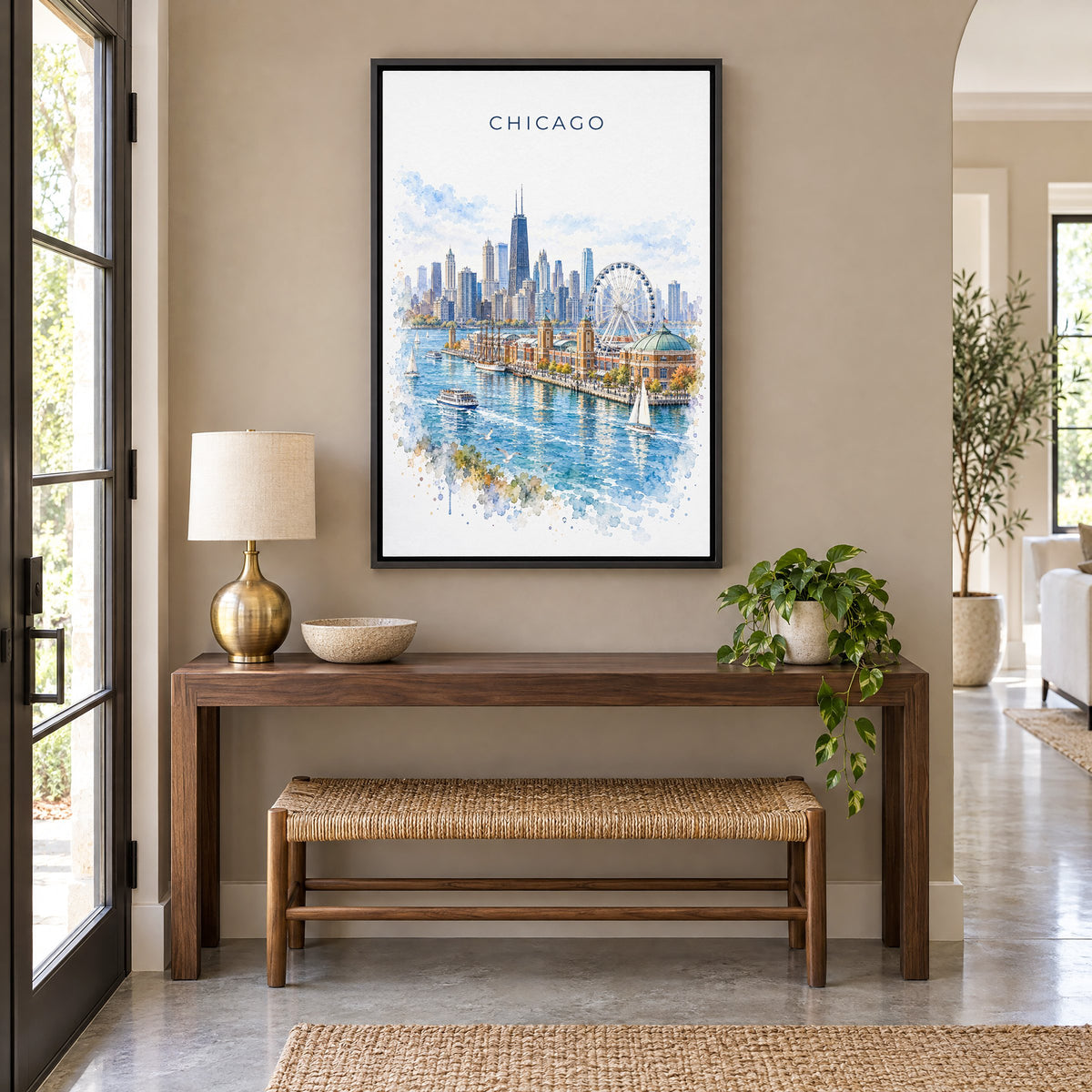 Navy Pier Chicago watercolor print as a black floater canvas above a walnut console and woven bench in an entryway