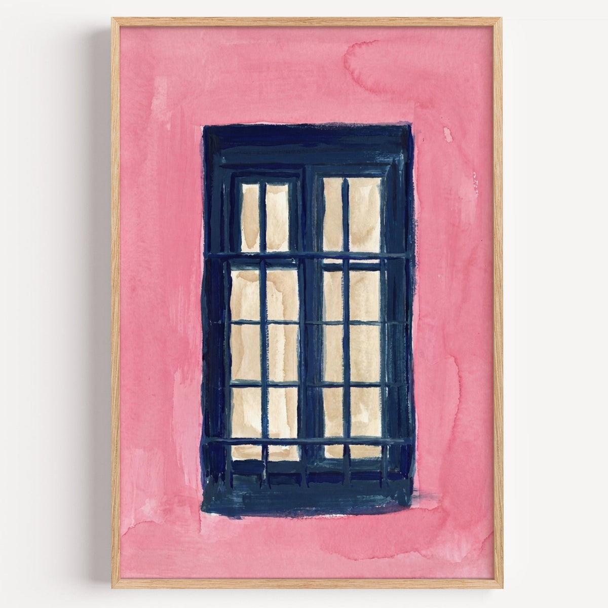 Navy window on pink wall print in a light oak frame on a plain white wall