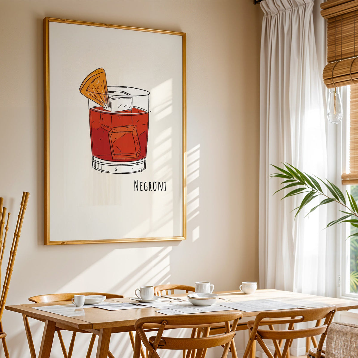 Negroni line print shown in a gold frame above a breakfast table by a curtained window