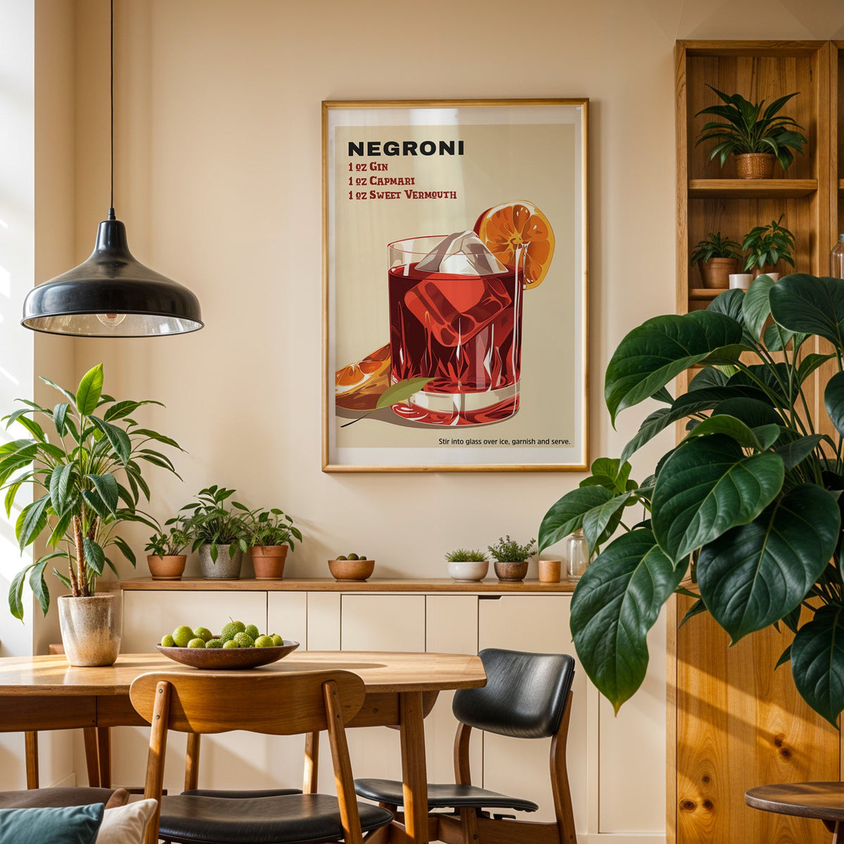 Negroni recipe print in an oak frame in a dining room above a plant-lined sideboard