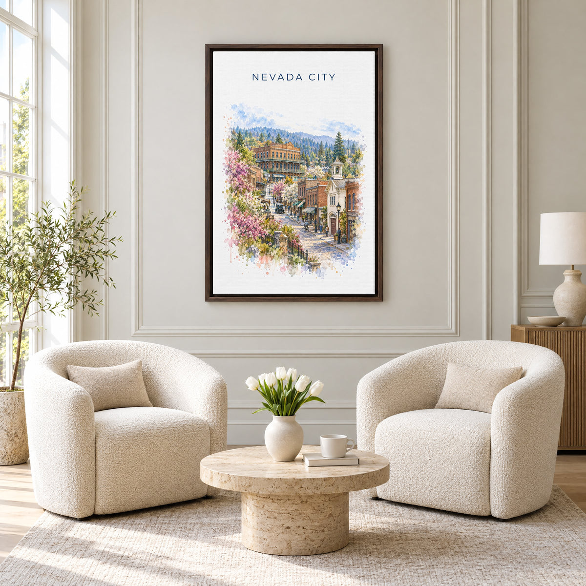 Nevada City, California watercolor print as an espresso floater canvas above two boucle armchairs in a hotel lounge