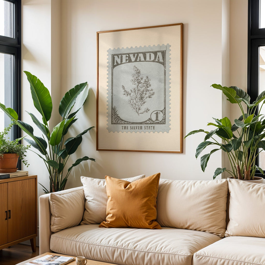Nevada state flower print framed above a cream sofa with an ochre cushion and large plants either side