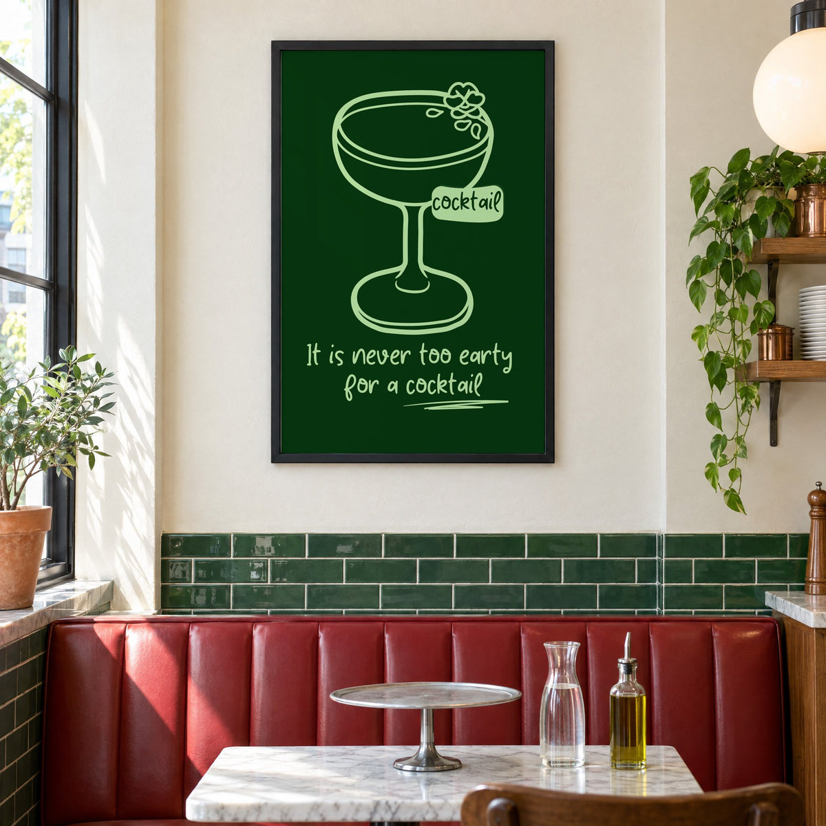 Never too early cocktail coupe print in a black frame above a red leather booth in a sunny pizzeria