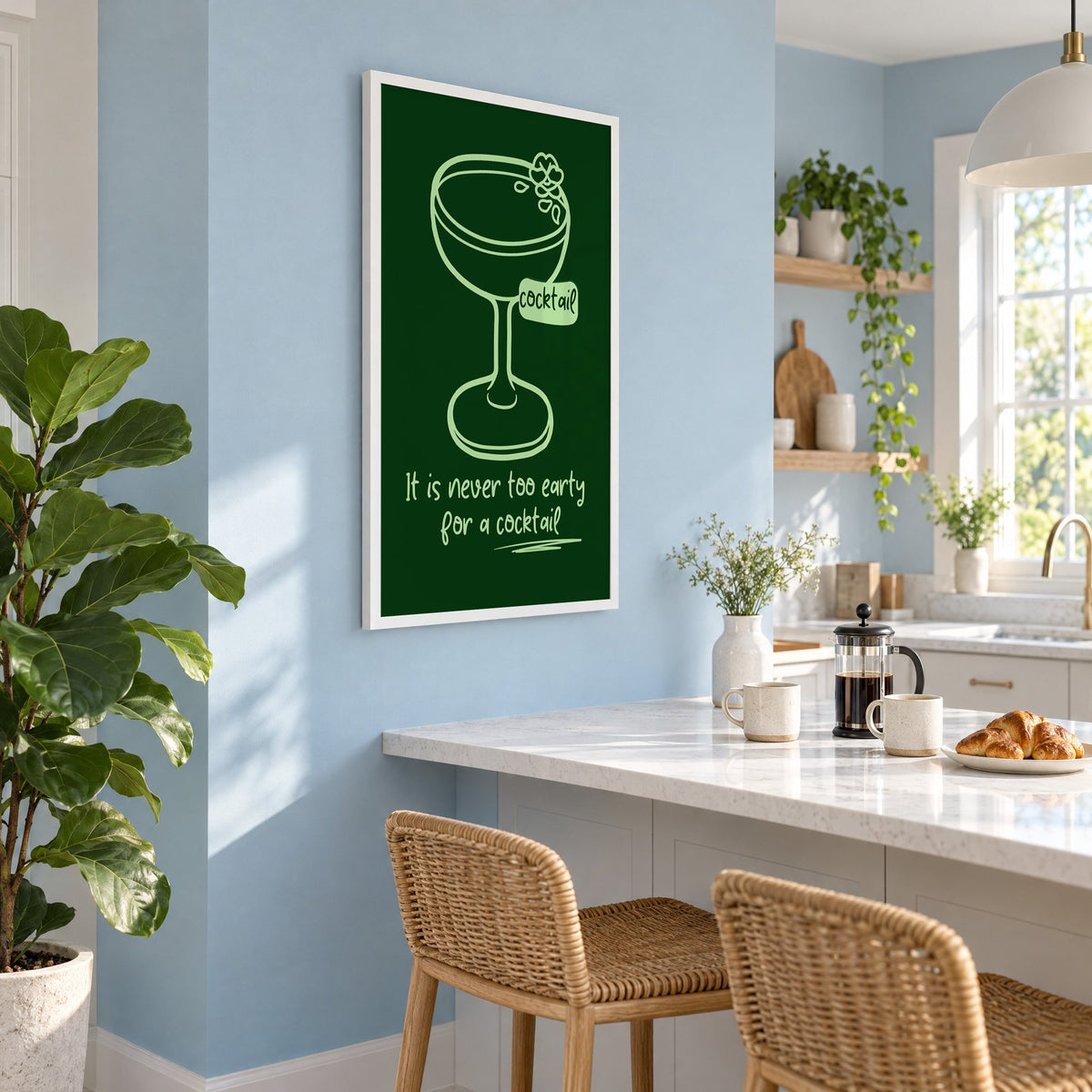Never too early cocktail coupe print in a white frame on a pale blue wall above a breakfast bar with rattan stools