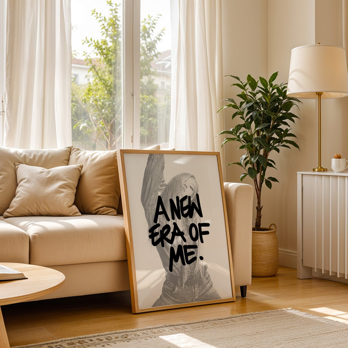 A new era of me lettering over woman in denim print in a light oak frame leaning on a cream sofa beside a floor lamp