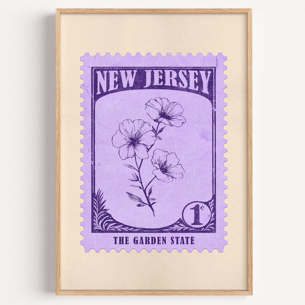 New Jersey state flower stamp print in deep violet on lavender, light oak frame on a plain white wall