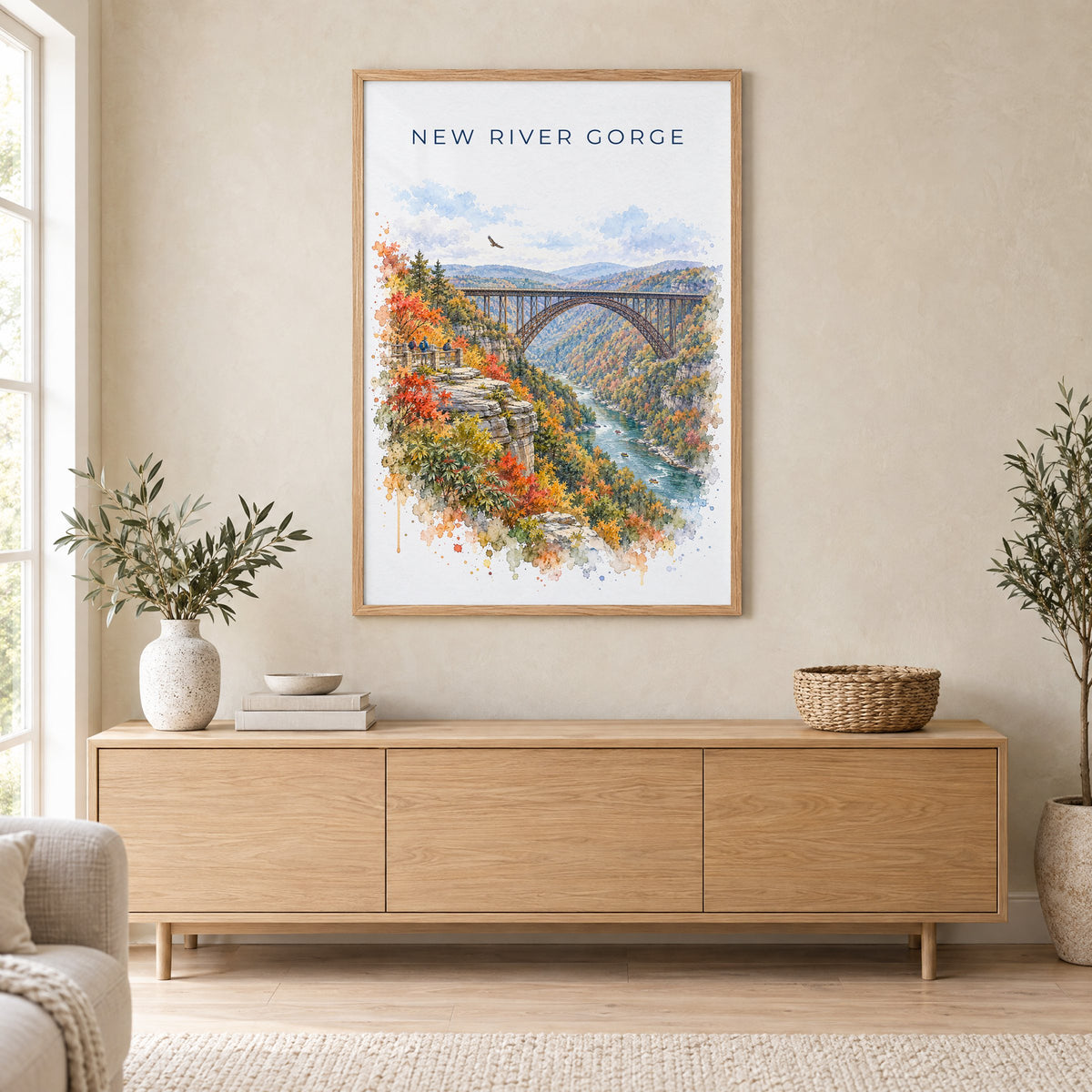 New River Gorge National Park watercolor print in an oak frame above a light wood sideboard in a Scandinavian living room
