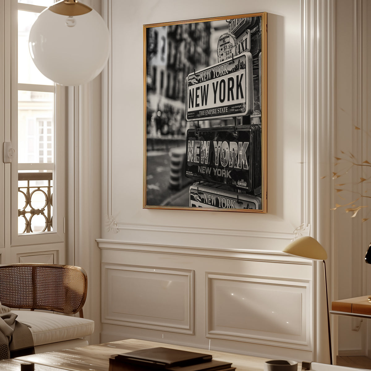 New York souvenir license plates on a rack print shown in a gold frame in a Parisian paneled living room