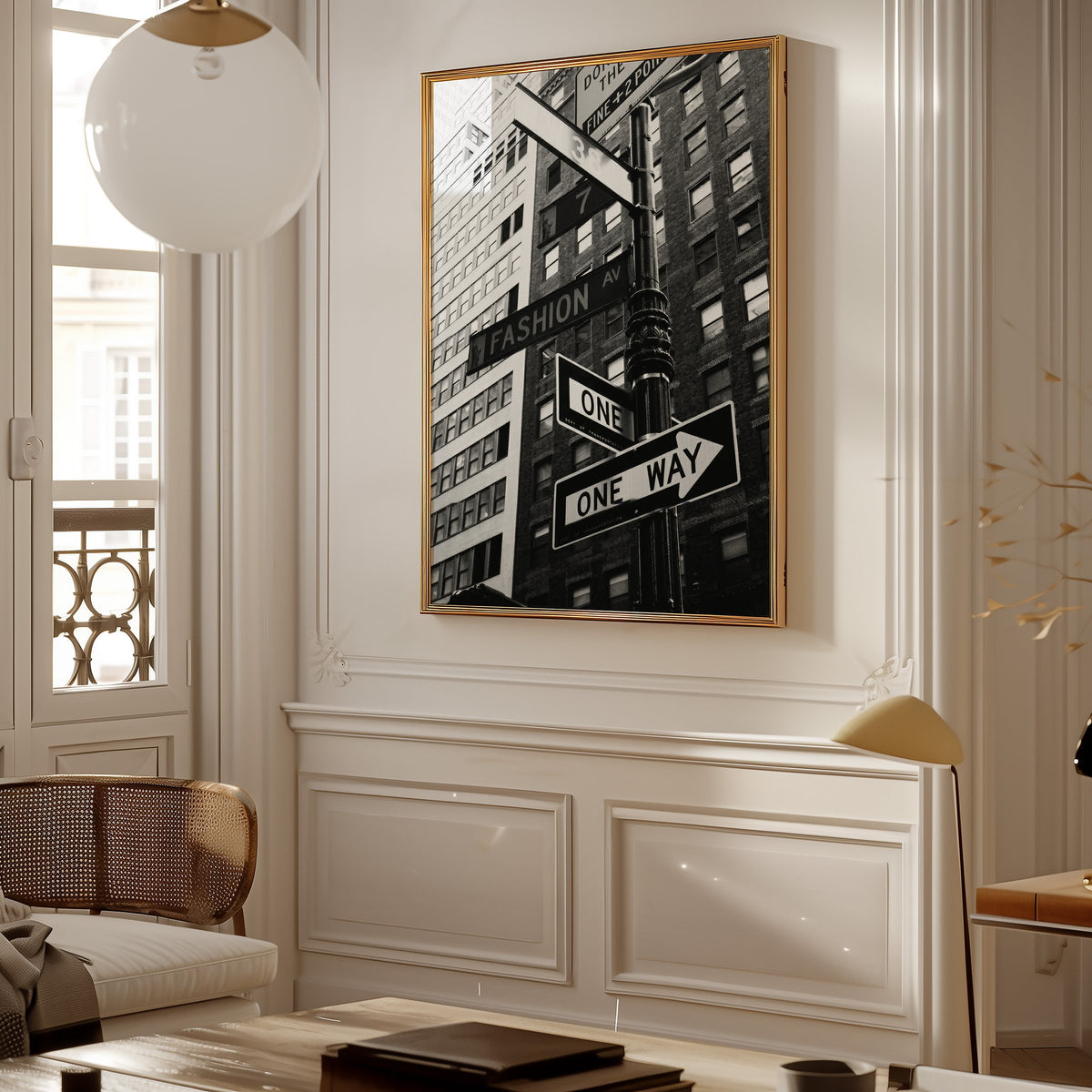 New York street sign pole with one way signs print shown in a gold frame in a Parisian paneled living room