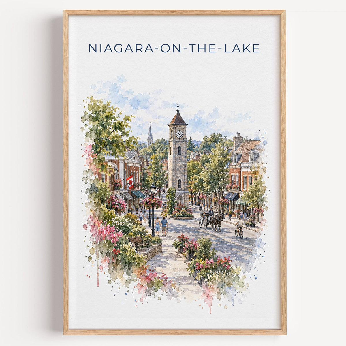 Niagara-on-the-Lake watercolor print in a light oak frame on a plain white wall