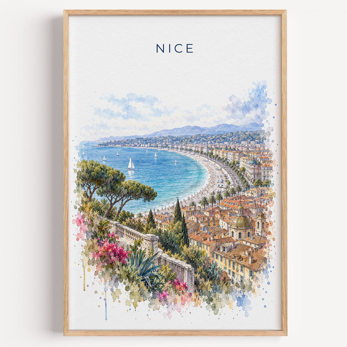 Nice, France watercolor print in a light oak frame on a plain white wall