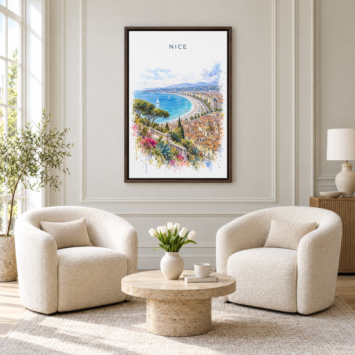 Nice, France watercolor print as an espresso floater canvas above two boucle armchairs in a hotel lounge
