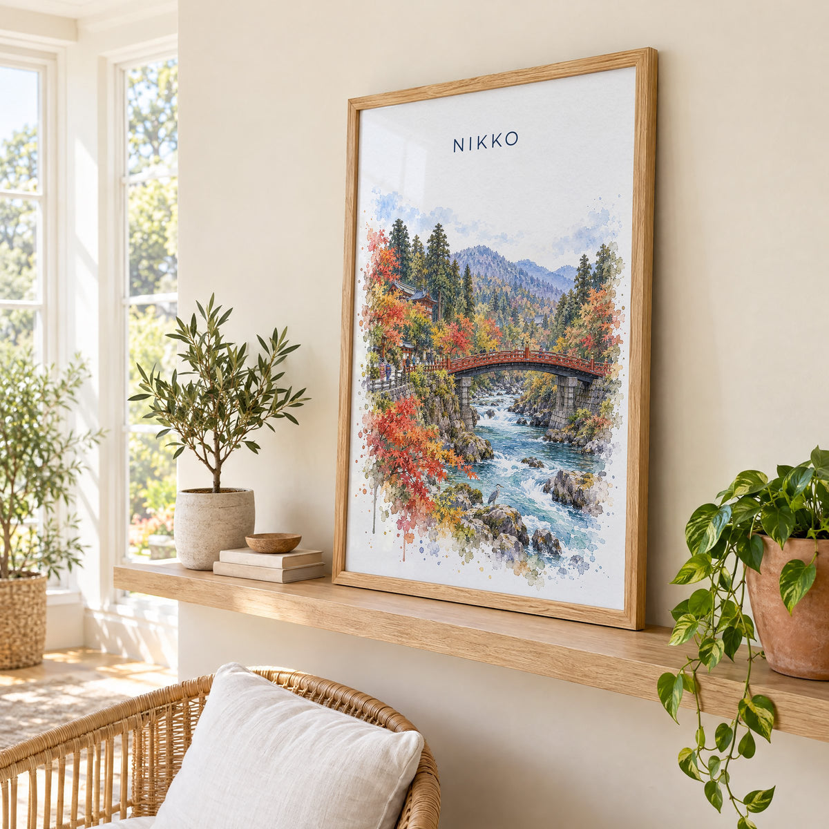 Nikko watercolor print in an oak frame on a picture ledge in a sunlit sunroom