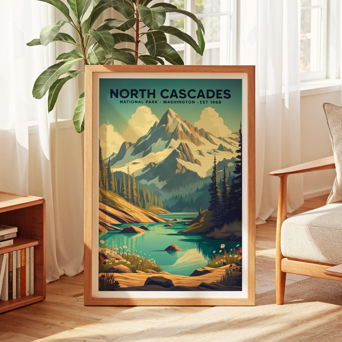 North Cascades National Park print in an oak frame by a sunlit window with sheer curtains and a fig plant