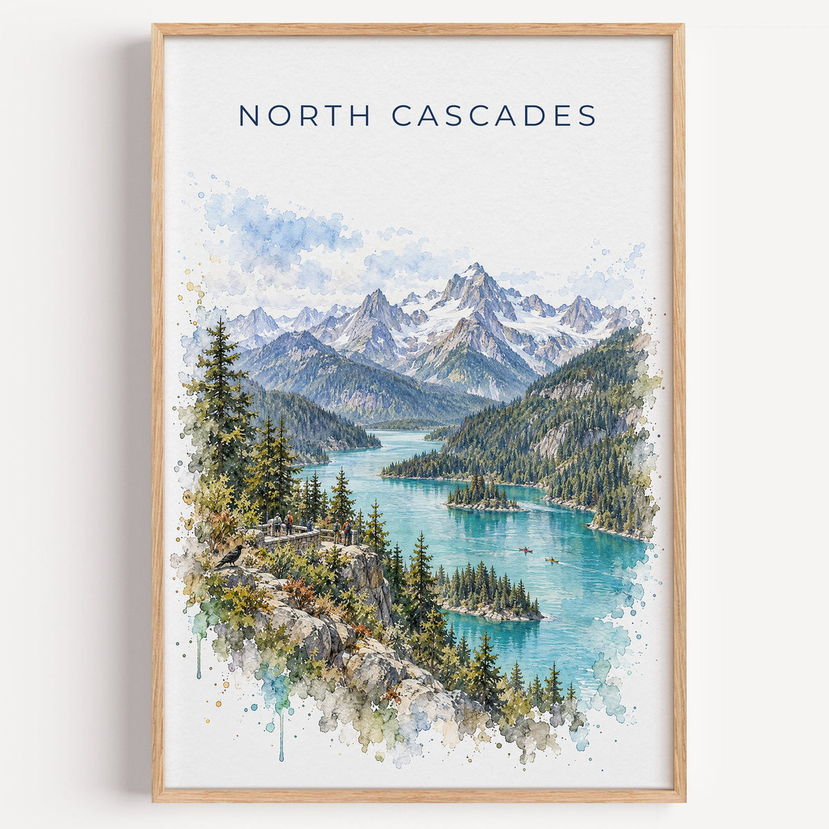 North Cascades National Park watercolor print in a light oak frame on a plain white wall