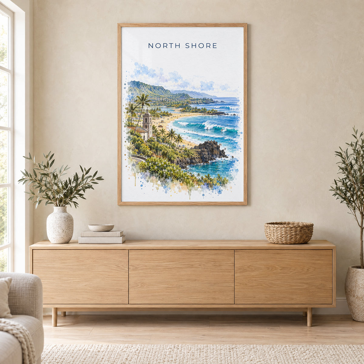 North Shore, Oahu watercolor print in an oak frame above a light wood sideboard in a Scandinavian living room