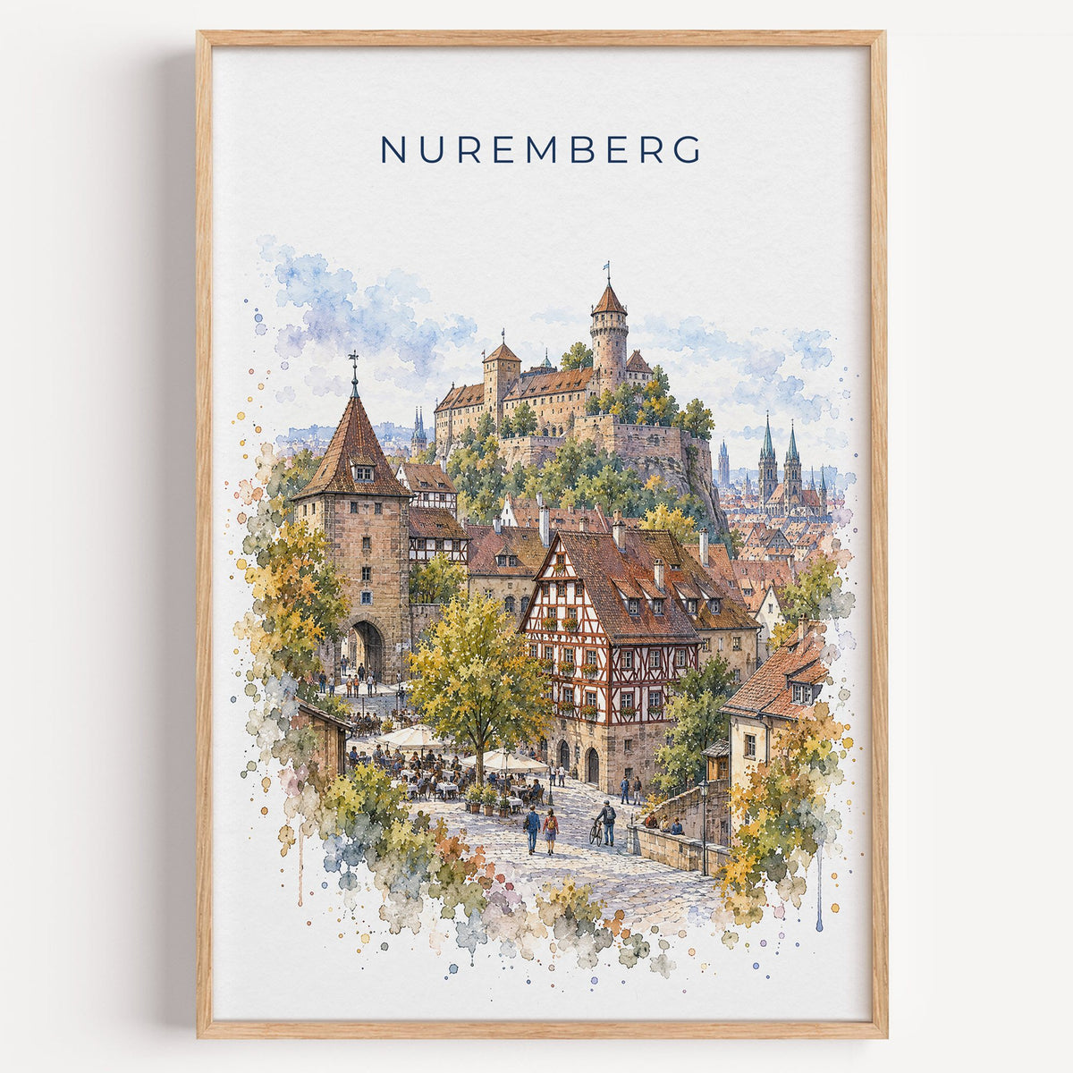 Nuremberg watercolor print in a light oak frame on a plain white wall
