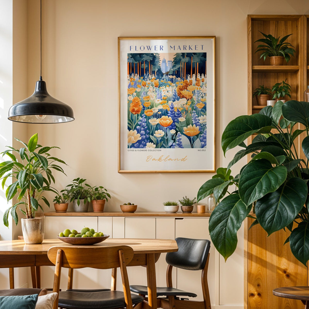 Oakland flower market print in an oak frame above a dining sideboard lined with potted plants