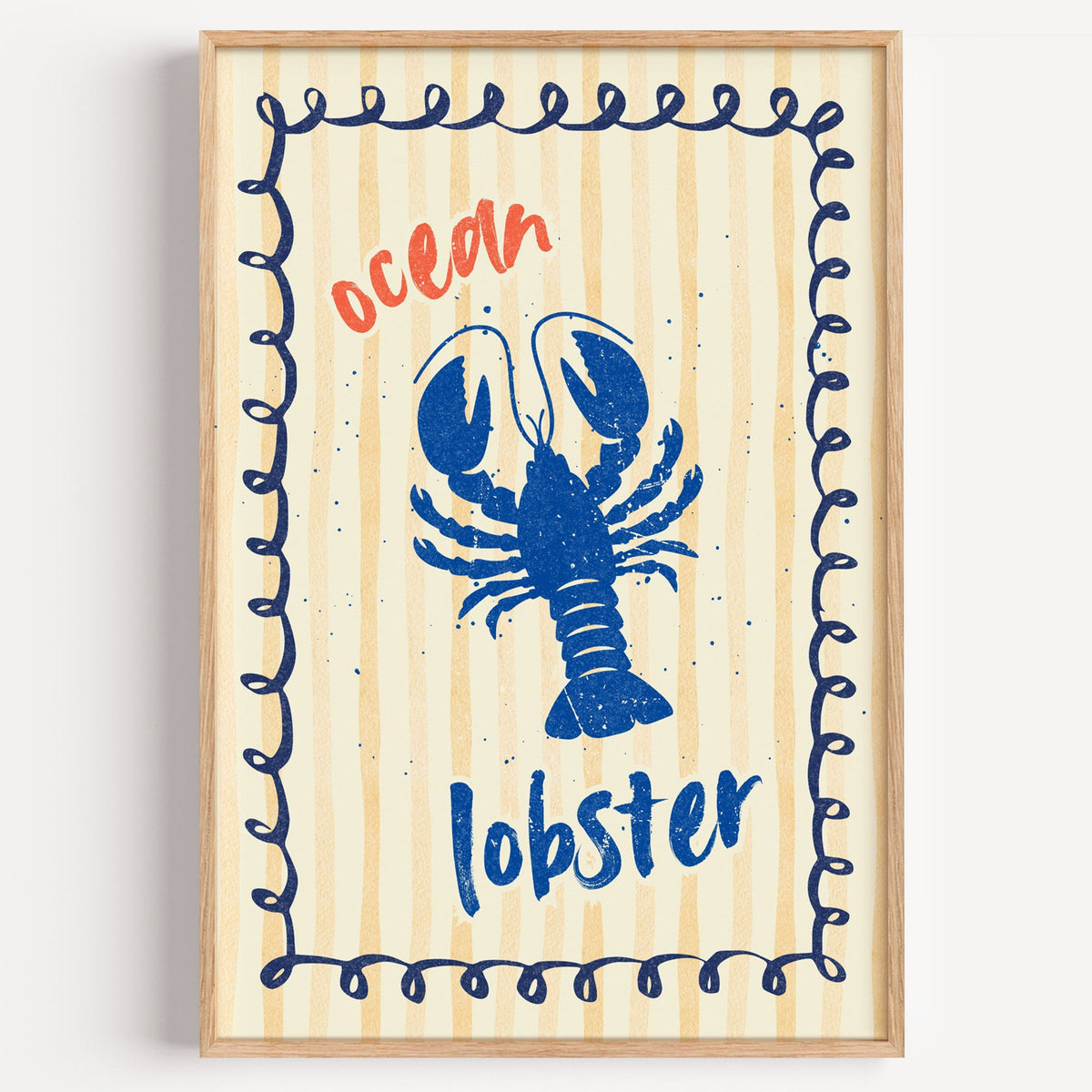 Ocean Lobster blue stamp print in a light oak frame on a plain white wall