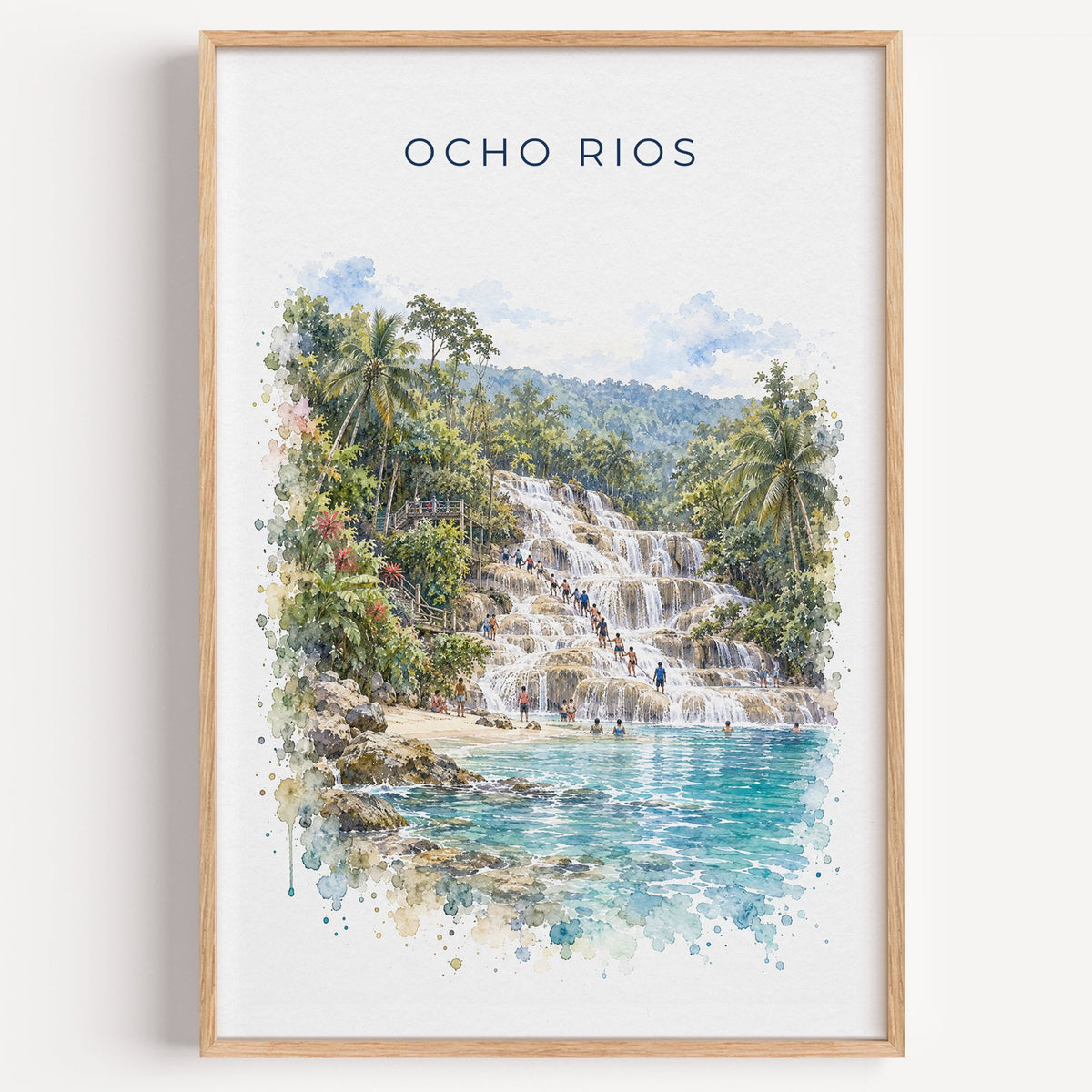 Ocho Rios watercolor print in a light oak frame on a plain white wall