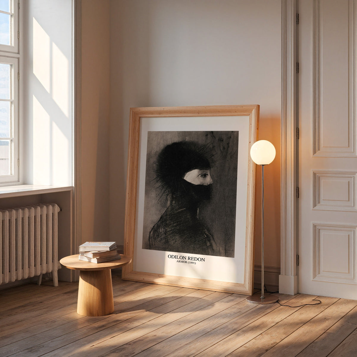 Armor charcoal print in a wide pine frame leaning by a sunlit window