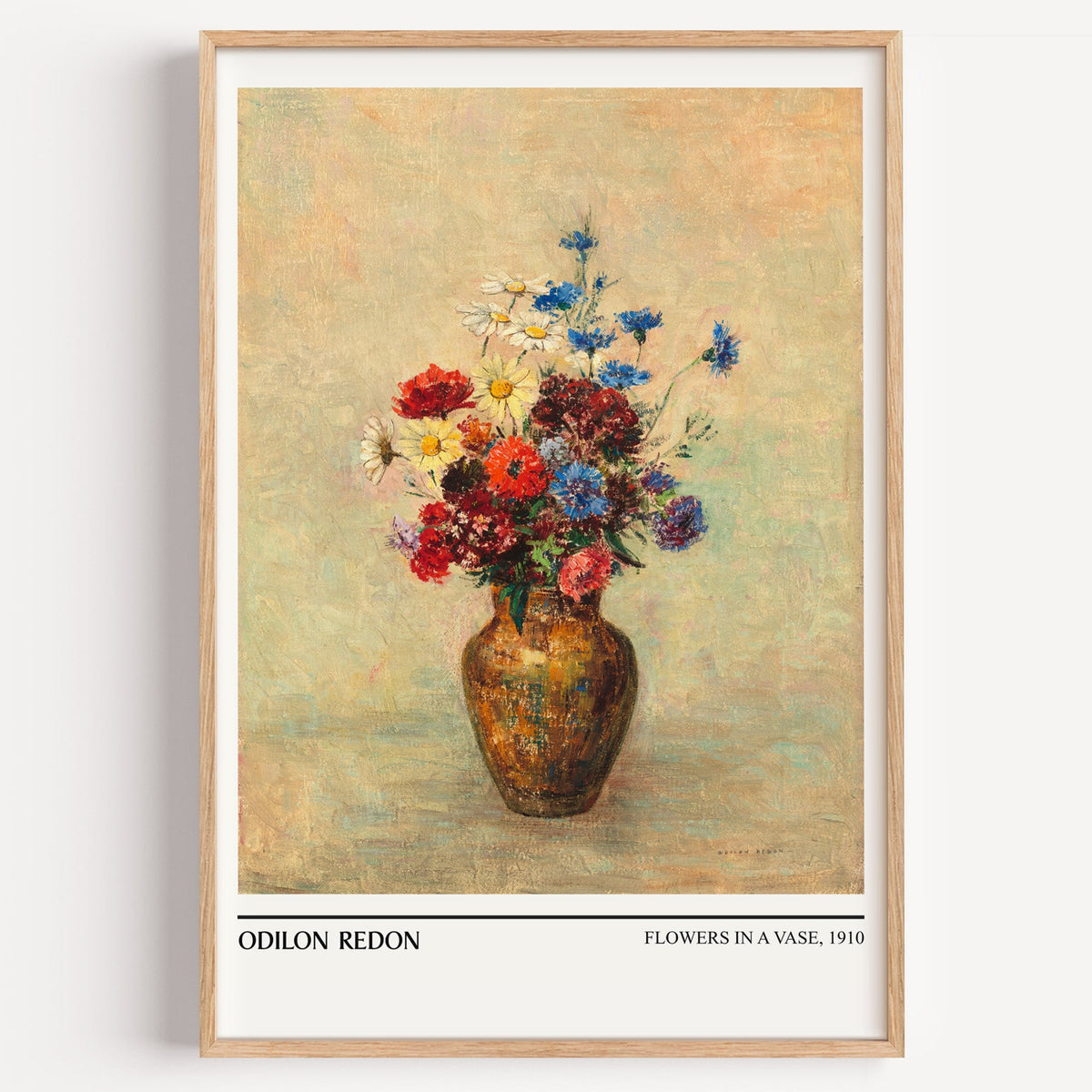 Odilon Redon Flowers in a Vase print in a light oak frame on a white wall