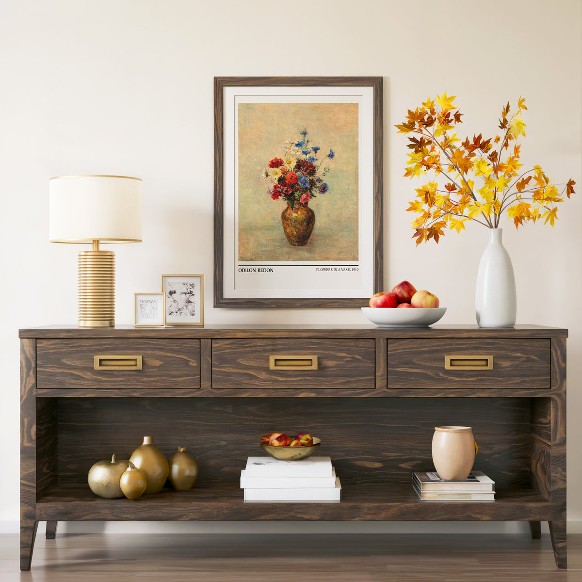 Flowers in a Vase print in a walnut frame above a console with autumn branches