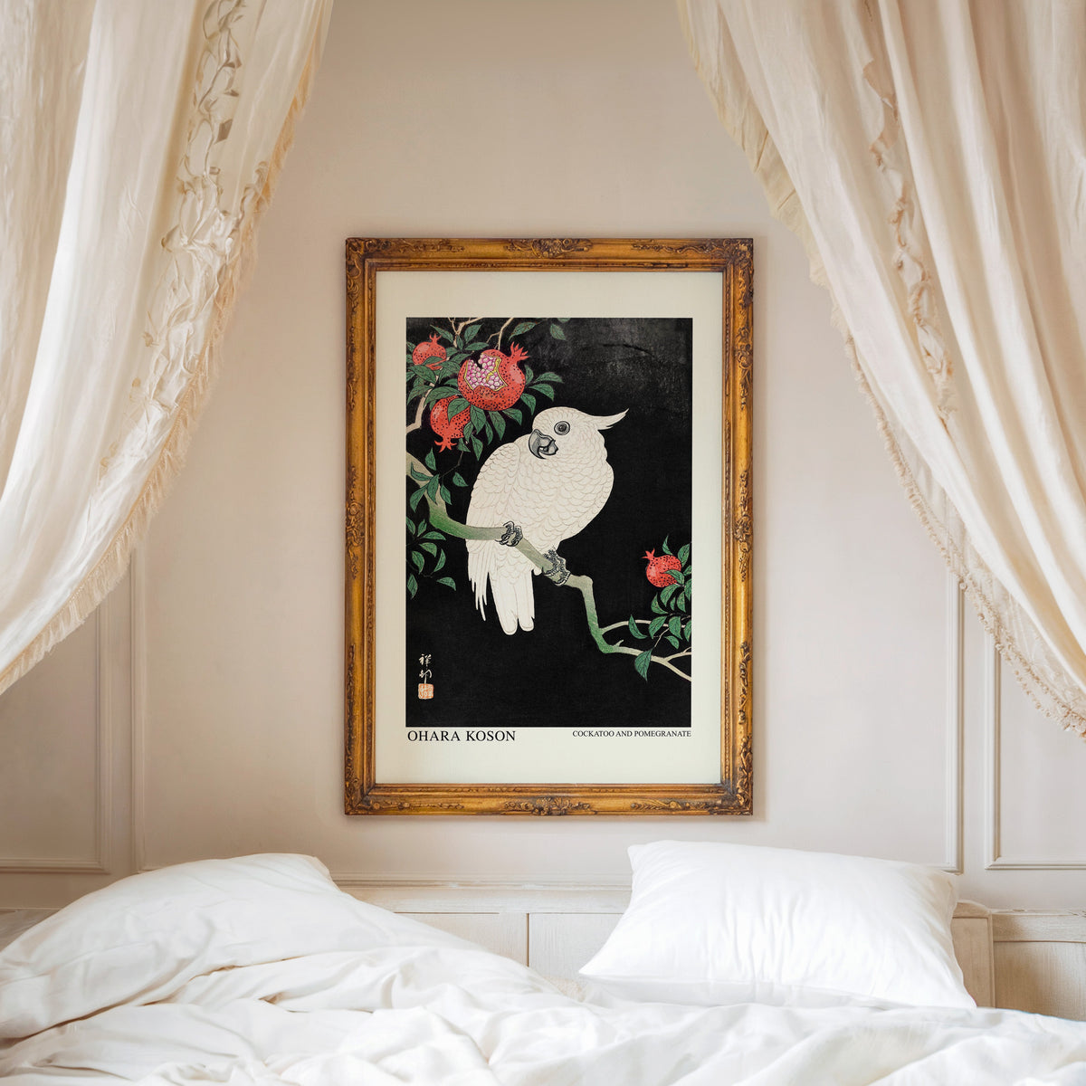 Cockatoo and Pomegranate print shown in a gold frame above a canopy bed