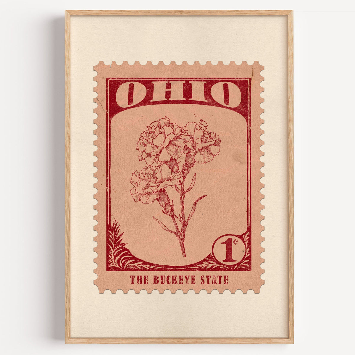 Ohio state flower stamp print in dark red on peach, light oak frame on a plain white wall