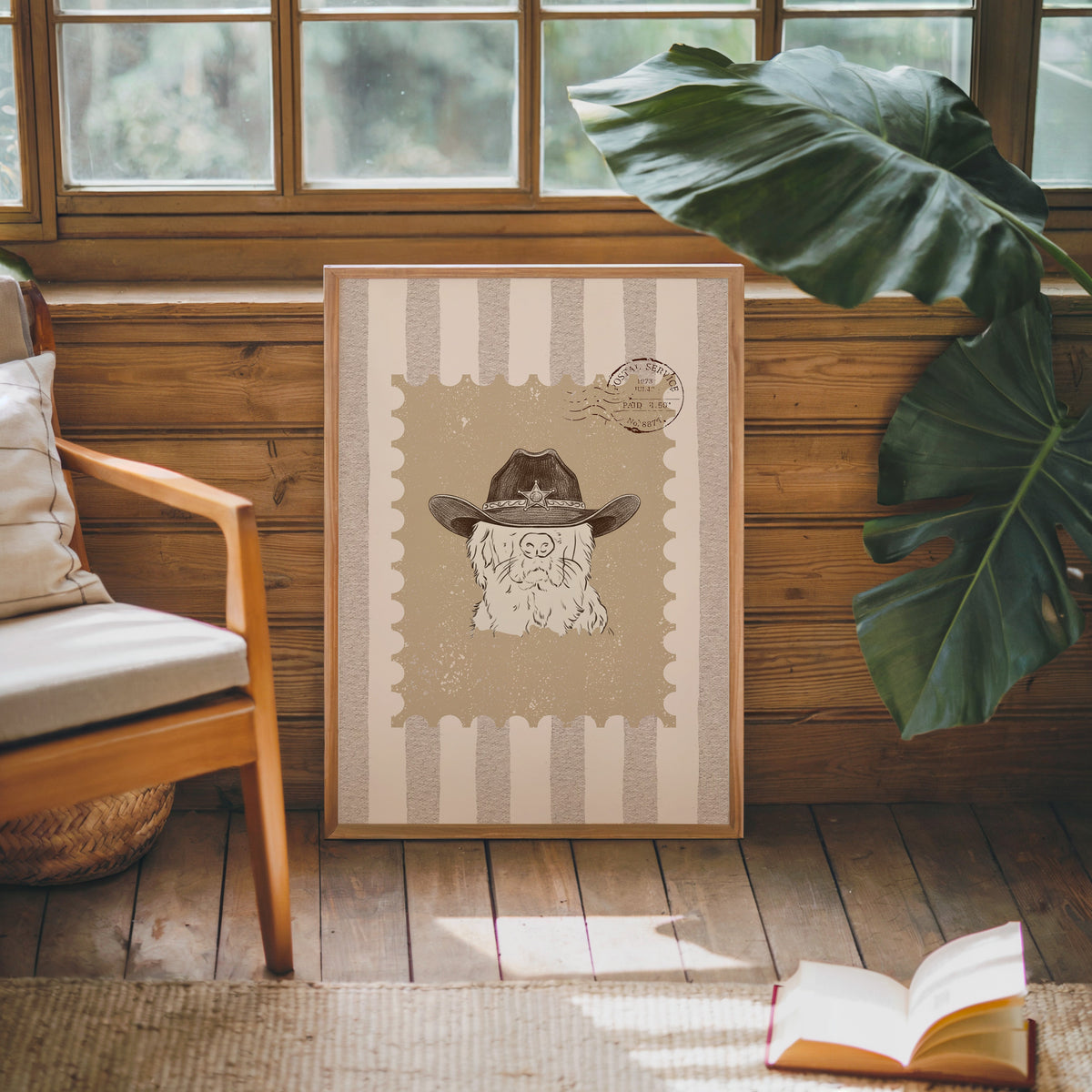 Old cowboy portrait print in an oak frame against a wood panel cabin wall