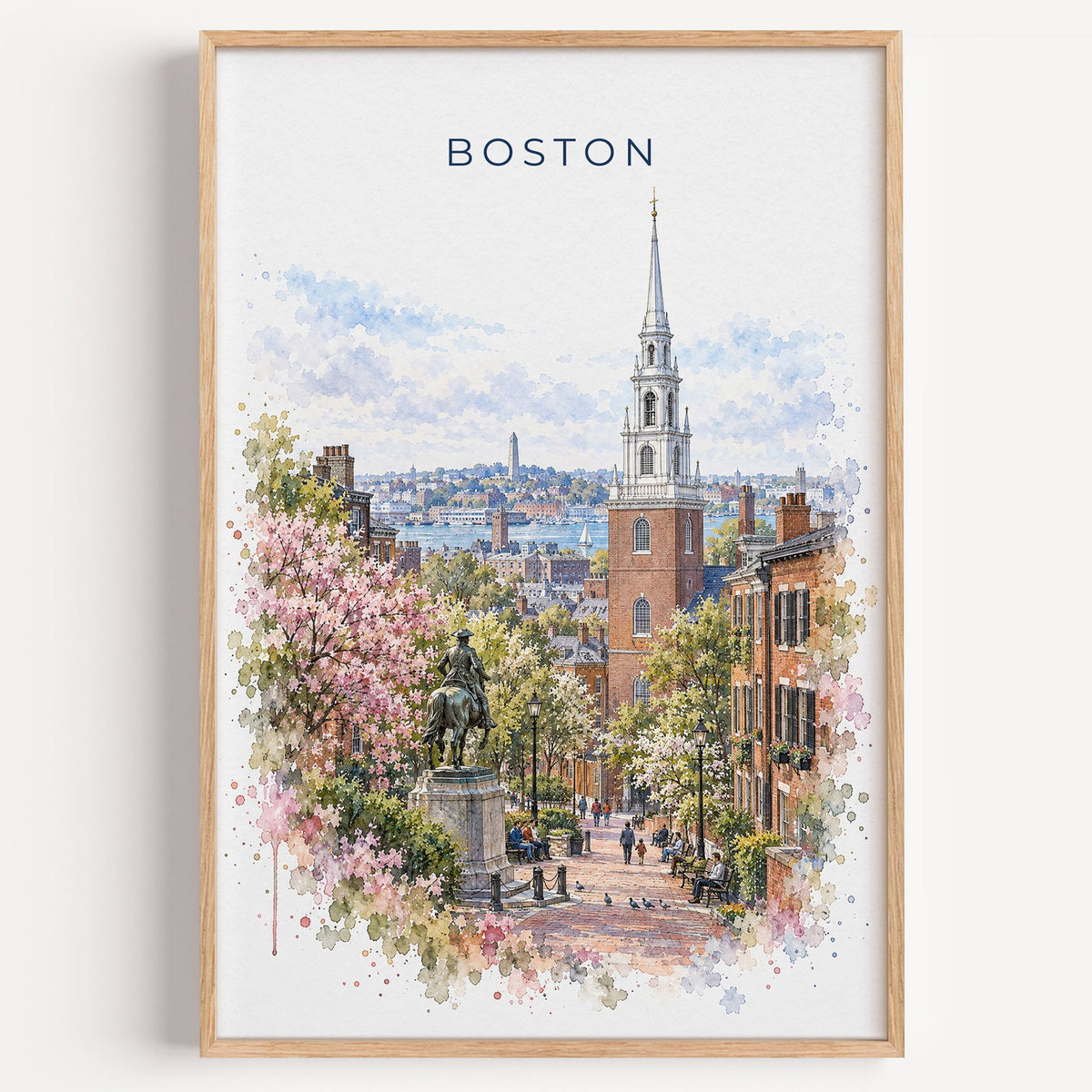 Old North Church Boston watercolor print in a light oak frame on a plain white wall