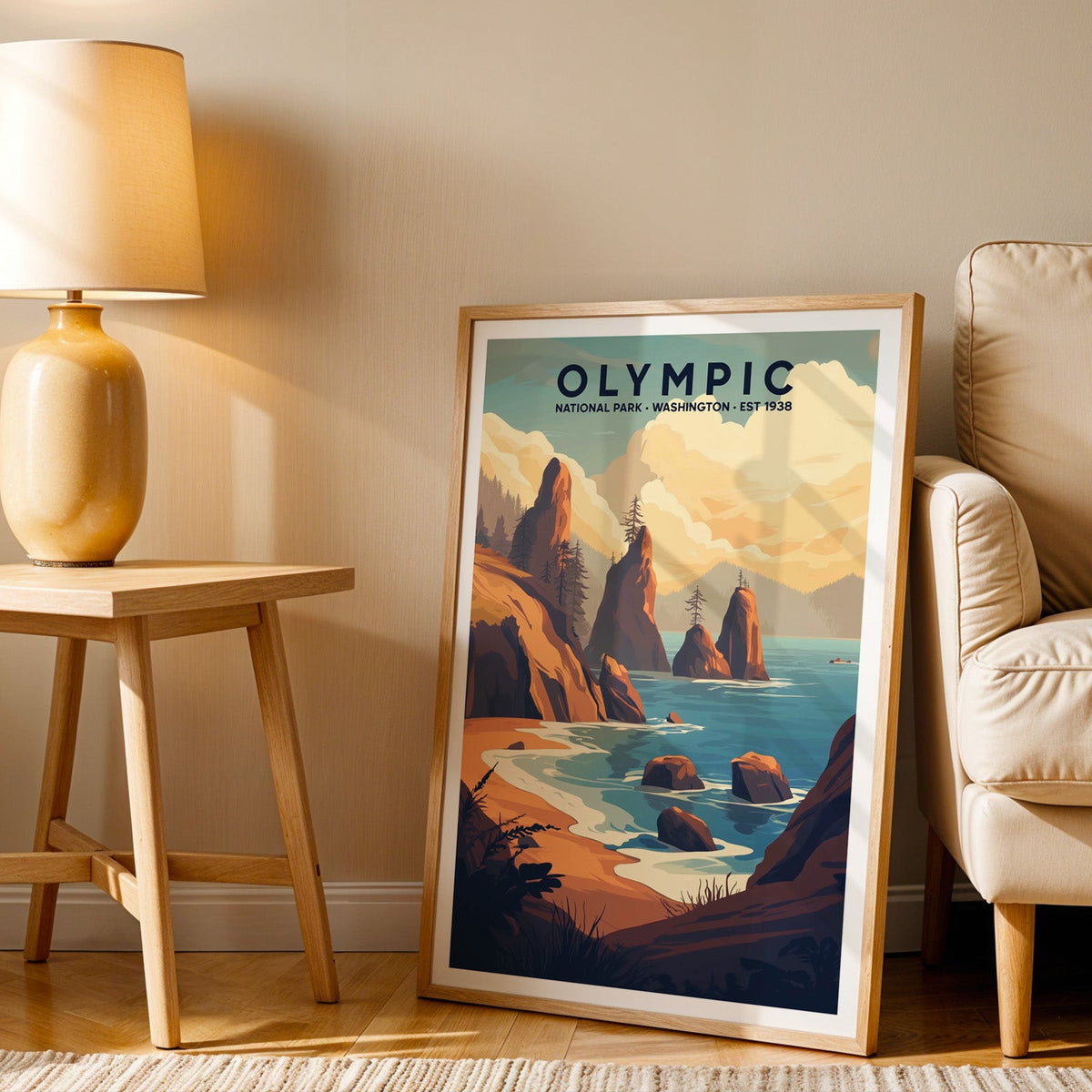 Olympic print in an oak frame beside a cream armchair and an amber lamp in warm afternoon light