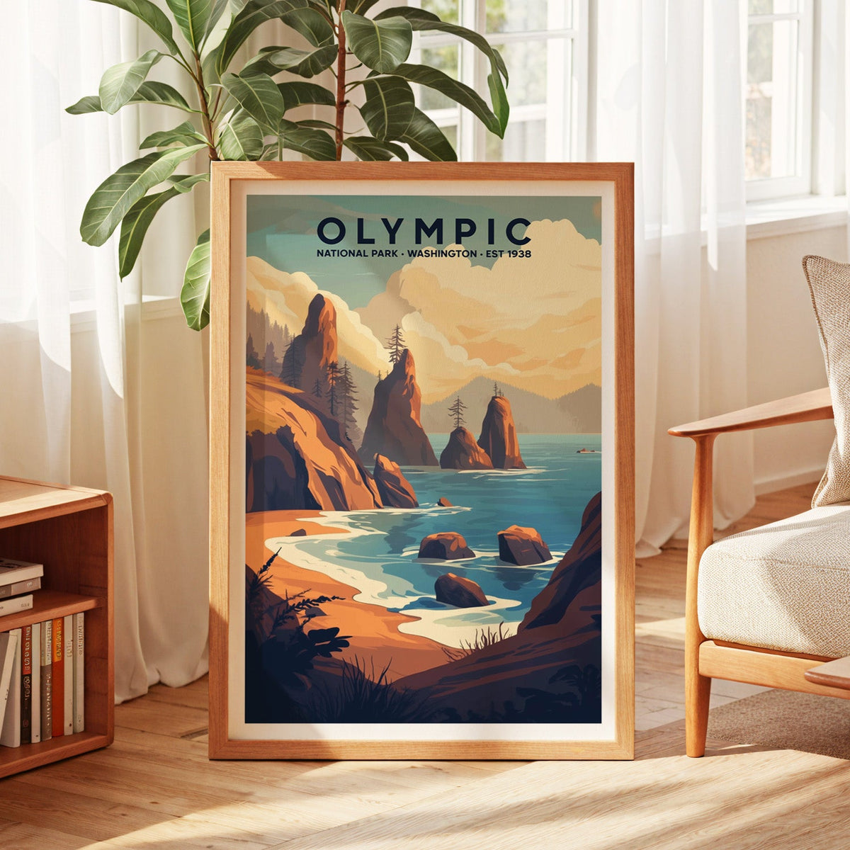 Olympic National Park print in an oak frame by a sunlit window with sheer curtains and a fig plant