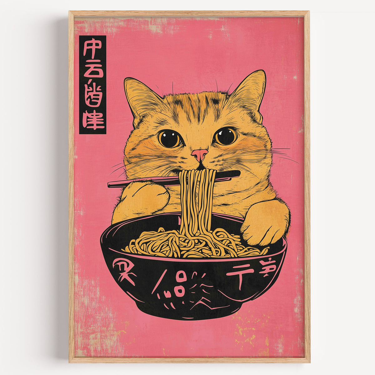 Orange tabby cat slurping ramen print in a light oak frame on a plain white wall