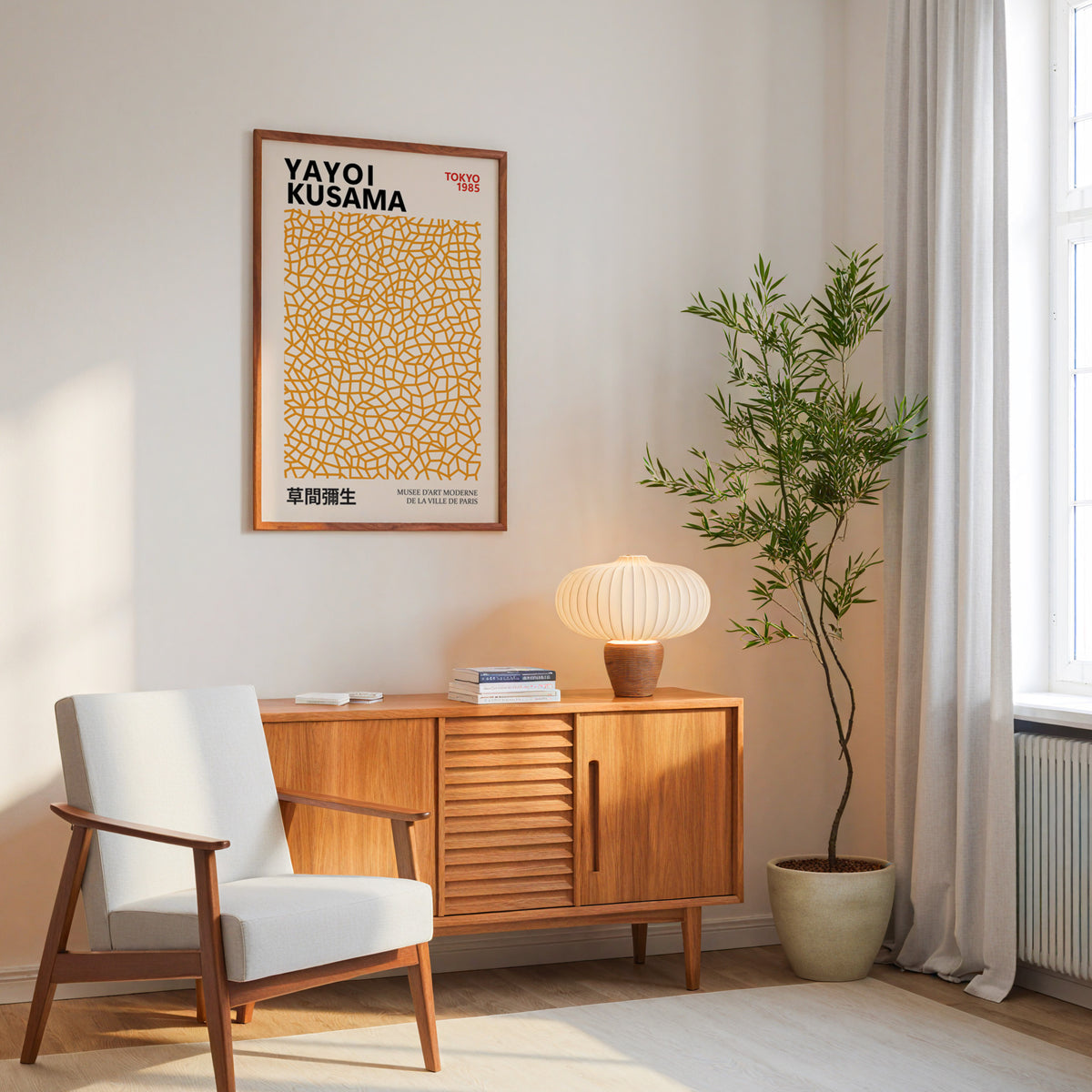 Yayoi Kusama inspired orange net pattern print above a mid-century sideboard