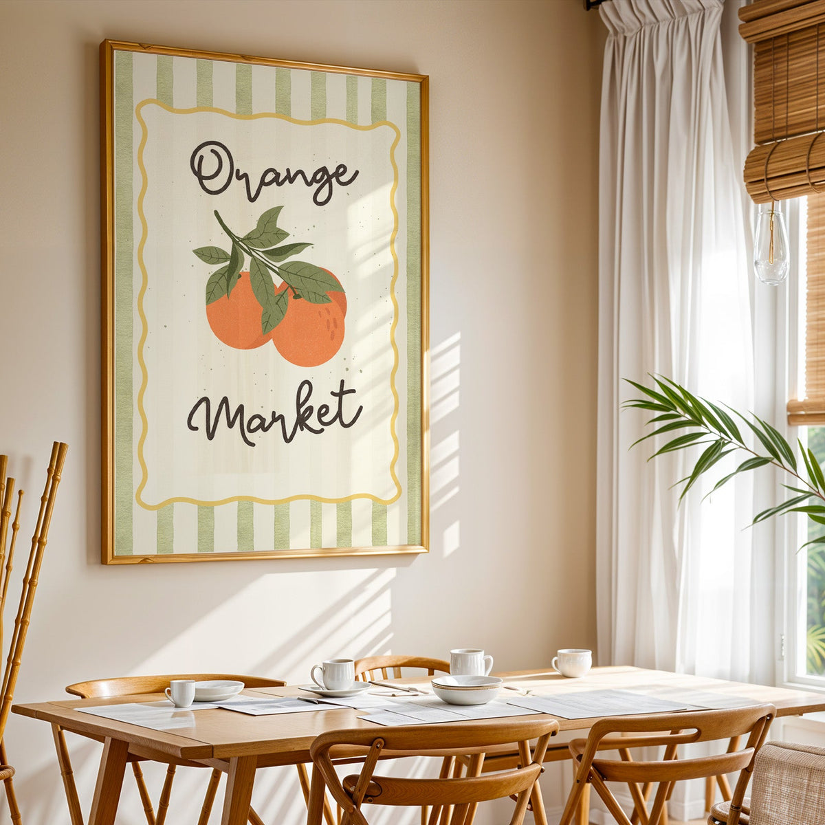 Orange Market print shown in a gold frame above a breakfast table by a curtained window