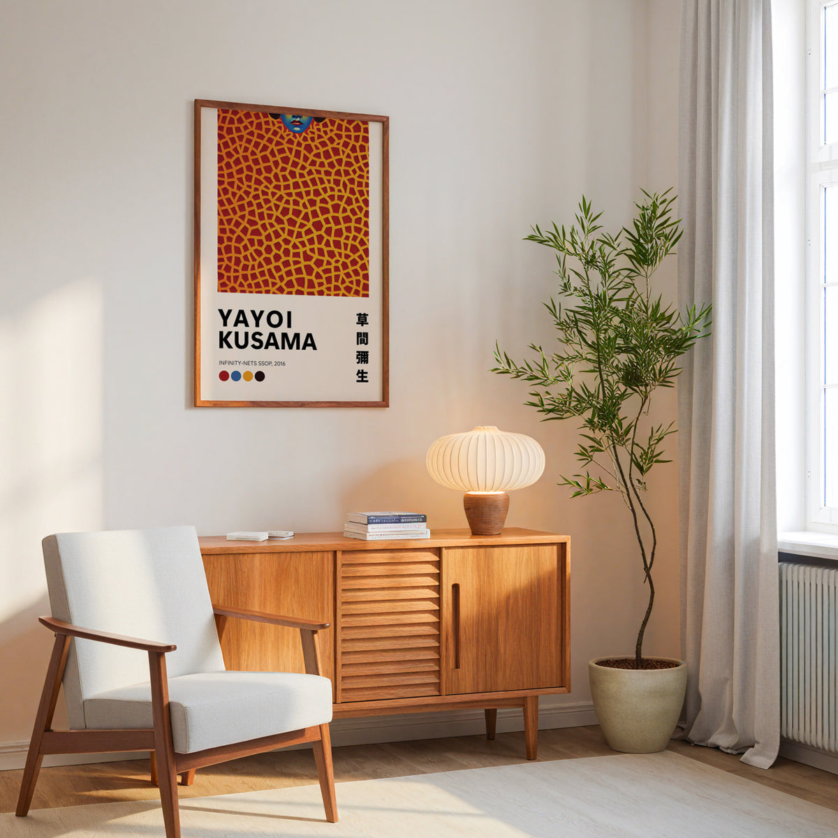 Yayoi Kusama inspired orange net and lips print above a mid-century sideboard