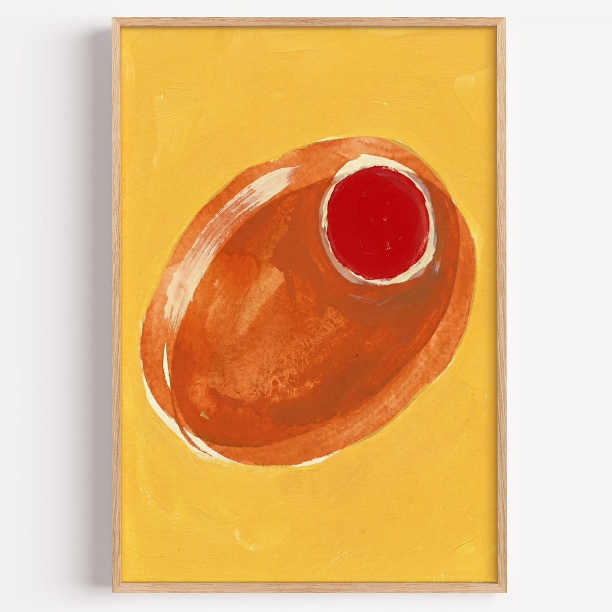 Orange stuffed olive print in a light oak frame on a plain white wall