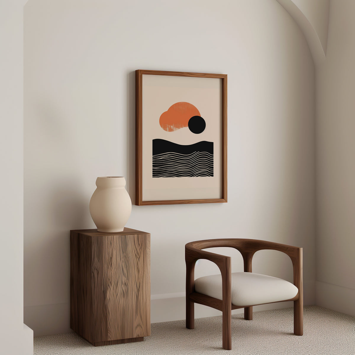 Orange sun and black wave mid century abstract print in a walnut frame above a wood pedestal and a curved walnut armchair