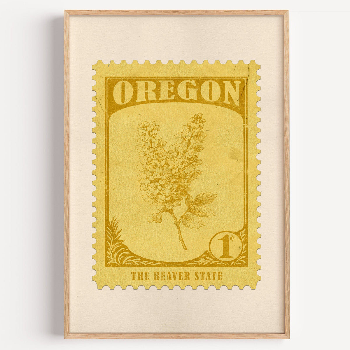 Oregon state flower stamp print in mustard gold on pale yellow, light oak frame on a plain white wall