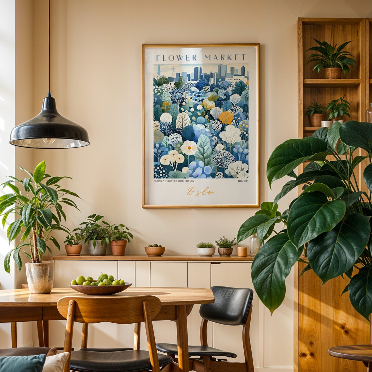 Oslo flower market print in an oak frame above a dining sideboard lined with potted plants