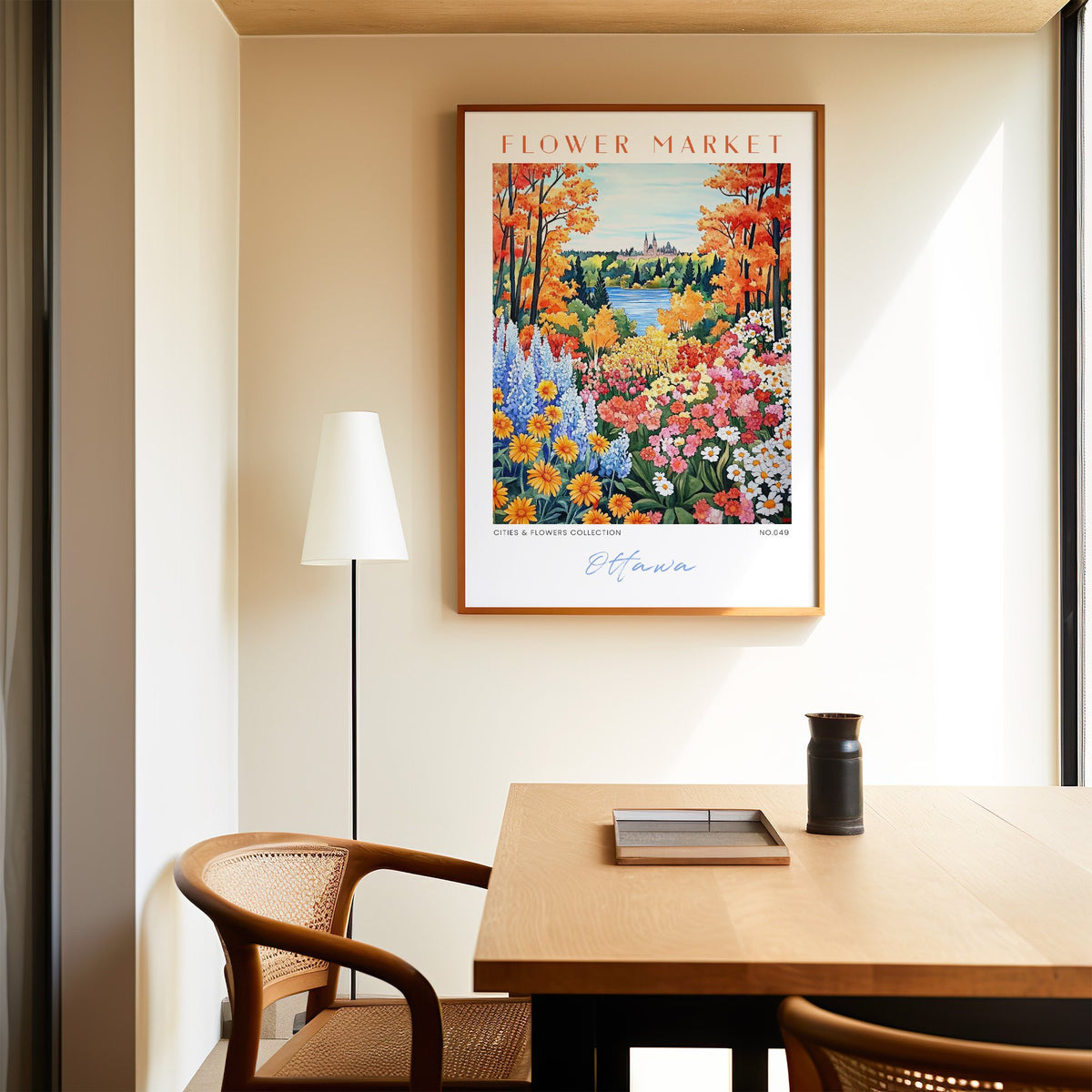 Ottawa flower market print in an oak frame above a dining table and cane chair
