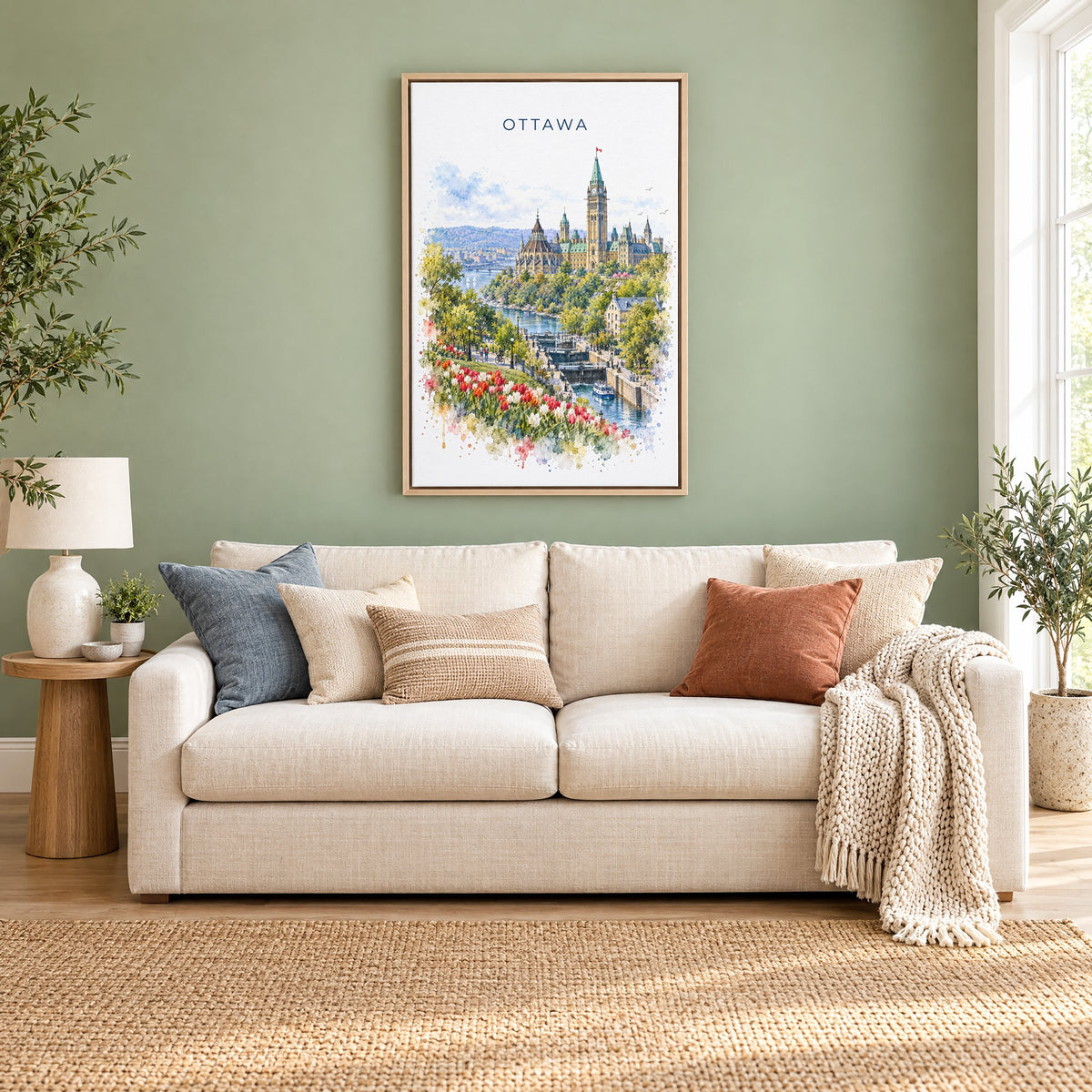 Ottawa watercolor print as a natural floater canvas above a cream linen sofa on a sage green wall