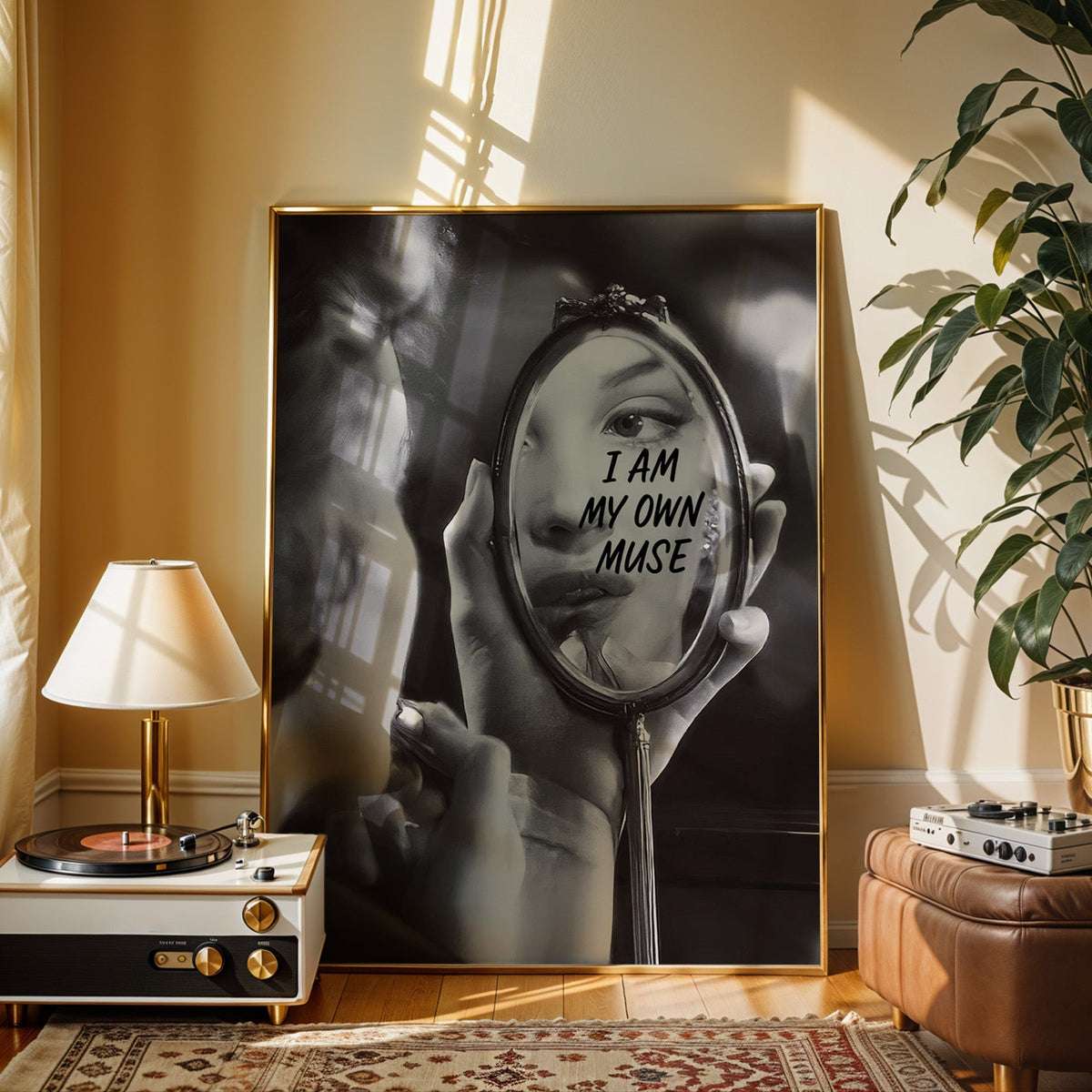 I am my own muse hand mirror portrait print shown in a gold frame beside a record player and table lamp