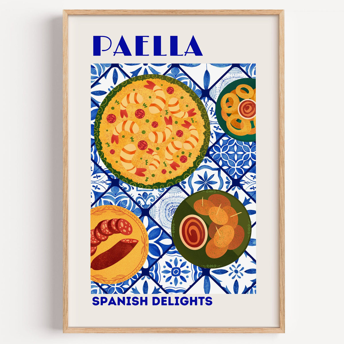 PAELLA Spanish Delights blue tile print in a light oak frame on a plain white wall