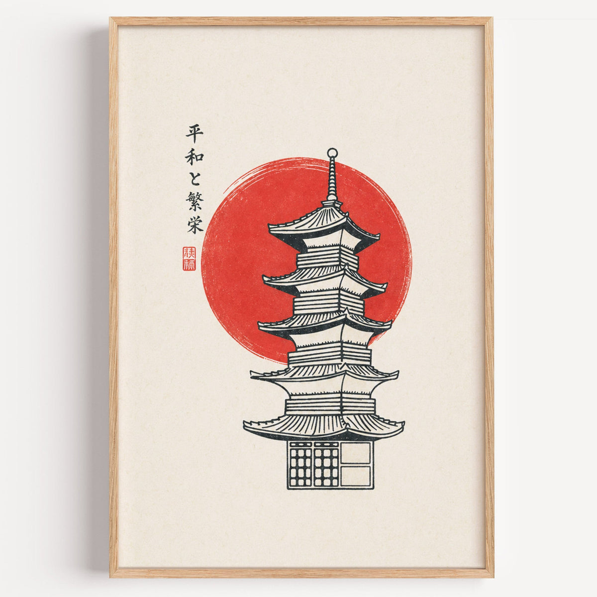 pagoda line art with red sun print in a light oak frame on a plain white wall