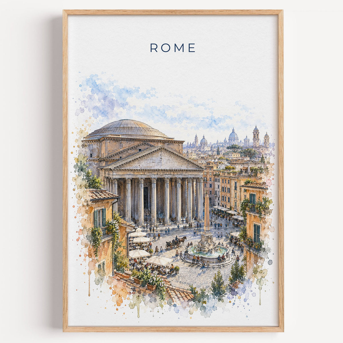 Pantheon Rome watercolor print in a light oak frame on a plain white wall