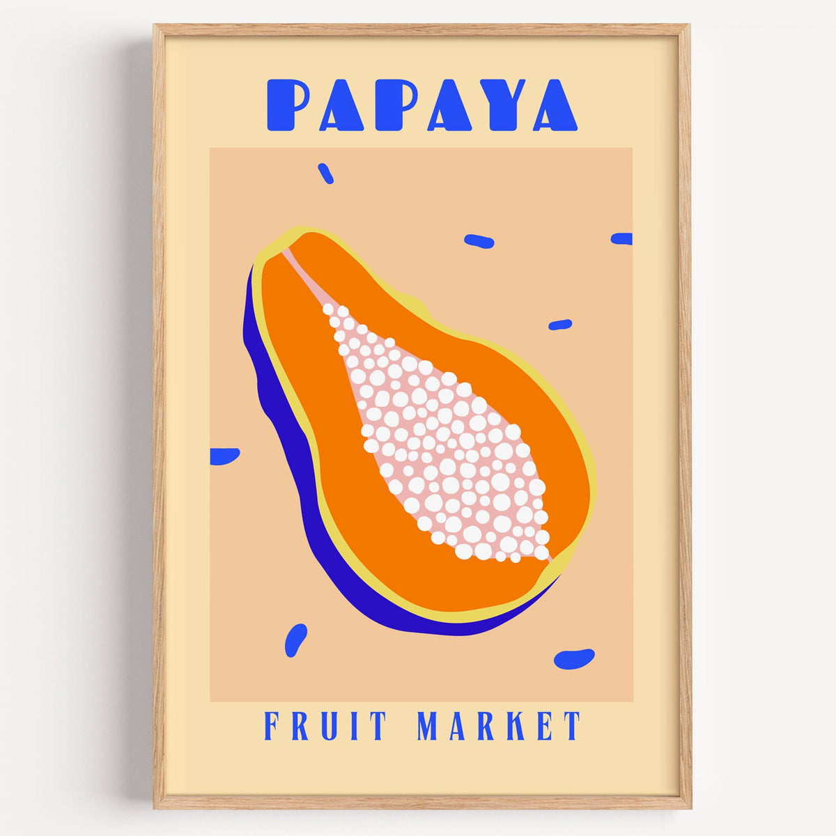 Papaya Fruit Market print in a light oak frame on a plain white wall